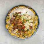 Guancia e gnocchi all’aneto