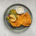 Maiale in panko, pesto e parmigiano